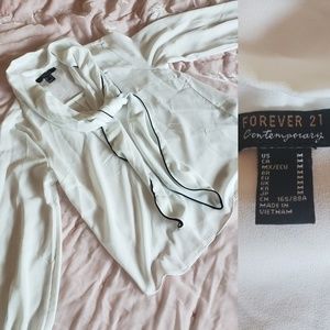 White blouse with black piping